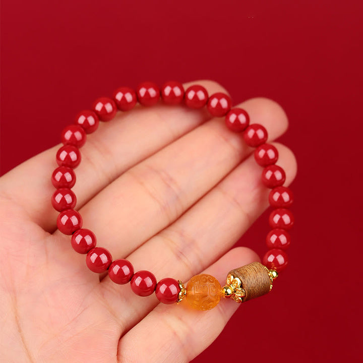 Bracelet de bénédiction en bois d'agar, ambre et cinabre de Buddha Stones
