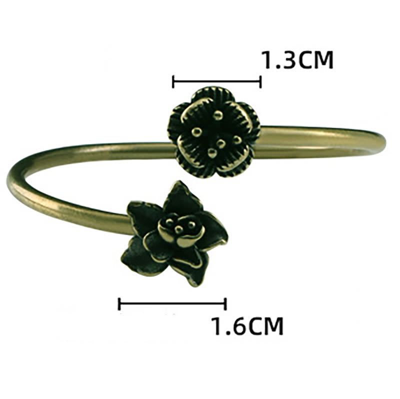 Bracelet de guérison en cuivre et laiton avec Buddha Stones et fleur de pêcher