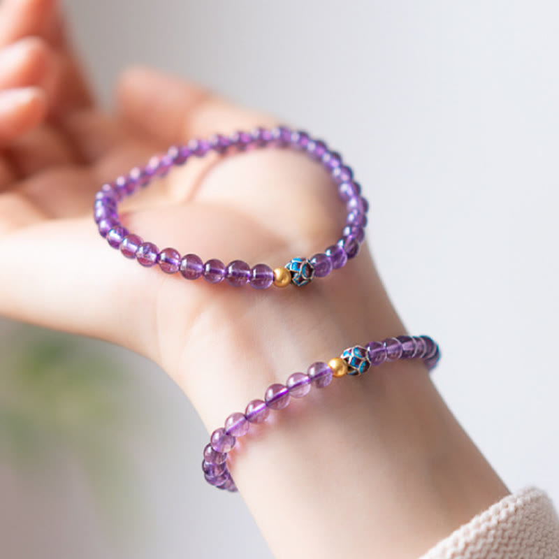 Bracelet de conscience spirituelle en améthyste naturelle et lotus de Buddha Stones