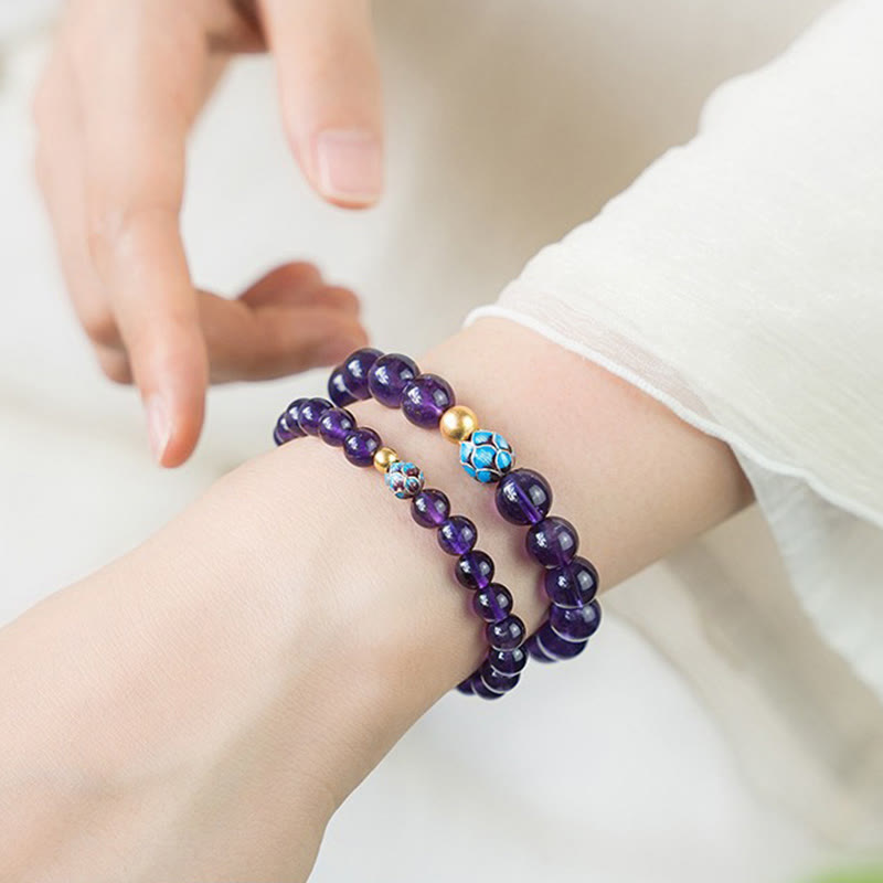 Bracelet de conscience spirituelle en améthyste naturelle et lotus de Buddha Stones