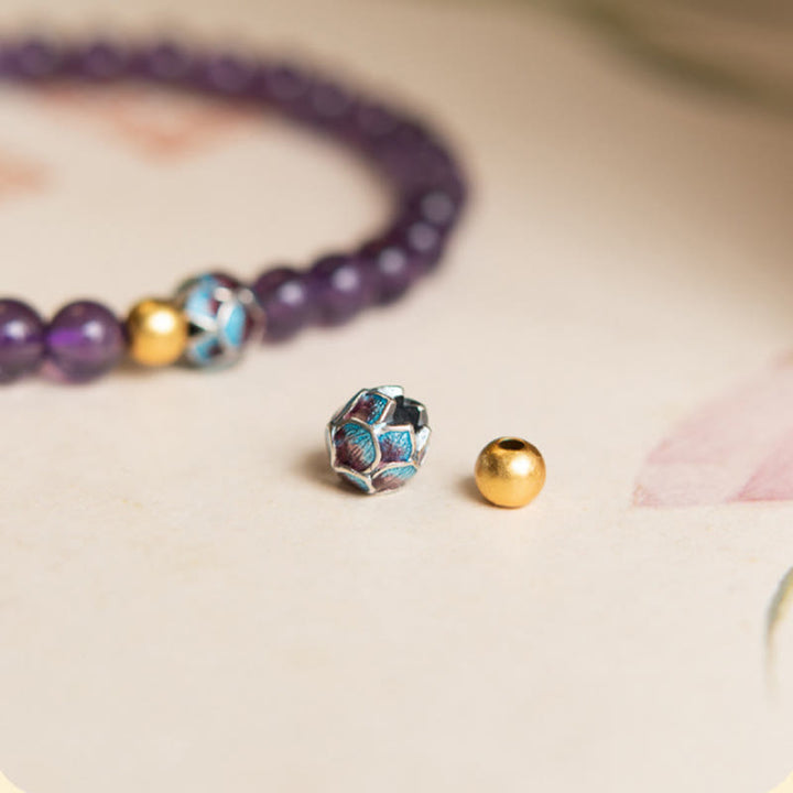 Bracelet de conscience spirituelle en améthyste naturelle et lotus de Buddha Stones