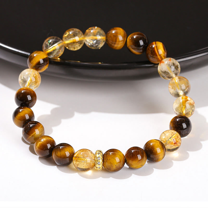 Bracelet de force en perles naturelles œil de tigre et citrine avec Buddha Stones