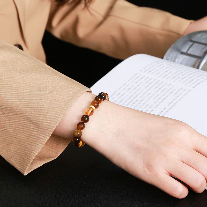 Bracelet de force en perles naturelles œil de tigre et citrine avec Buddha Stones