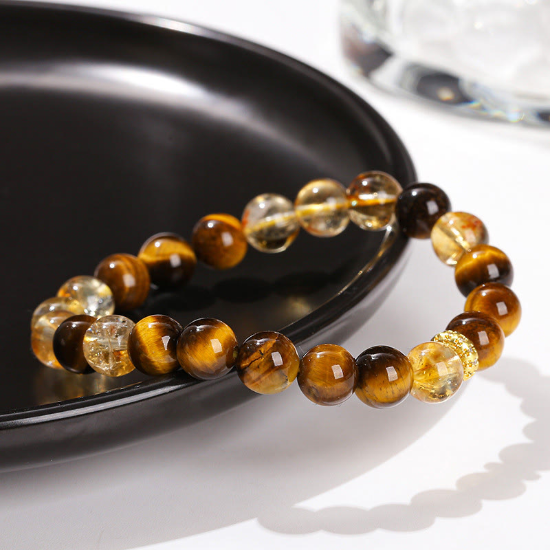 Bracelet de force en perles naturelles œil de tigre et citrine avec Buddha Stones