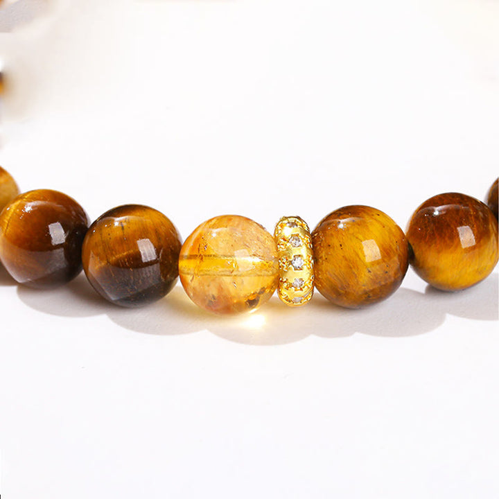 Bracelet de force en perles naturelles œil de tigre et citrine avec Buddha Stones