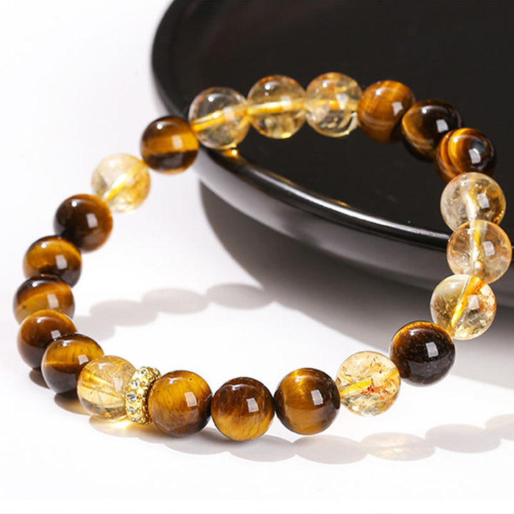 Bracelet de force en perles naturelles œil de tigre et citrine avec Buddha Stones