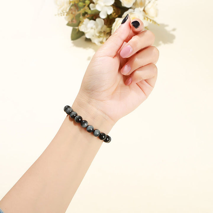 Bracelet de courage positif en pierre naturelle œil d'aigle de Buddha Stones