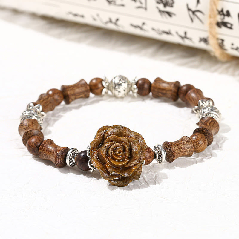 Bracelet de guérison camélia en bois de santal et bambou avec Buddha Stones