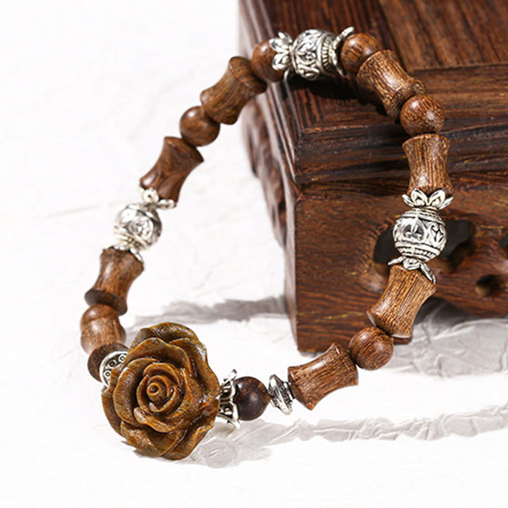 Bracelet de guérison camélia en bois de santal et bambou avec Buddha Stones