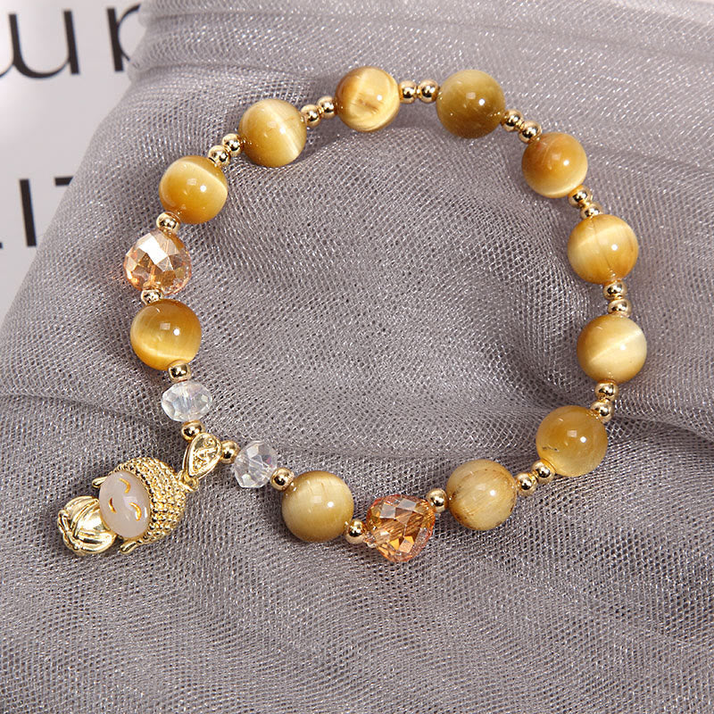 Bracelet de protection Bouddha en Buddha Stones avec œil de tigre jaune