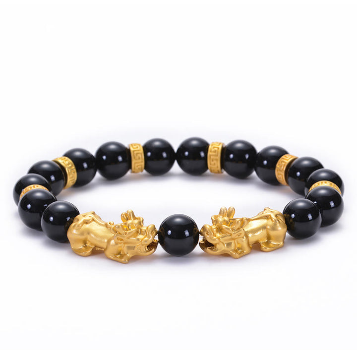 Bracelet de force en Buddha Stones en obsidienne noire et onyx noir en alliage doré à deux PiXiu Om Mani Padme Hum