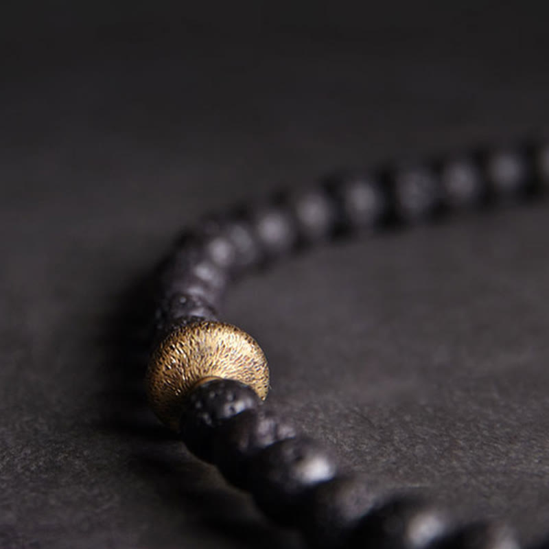 Bracelet de guérison à double tour en perles de cuivre et de laiton avec Buddha Stones de lave vintage à trois yeux Dzi