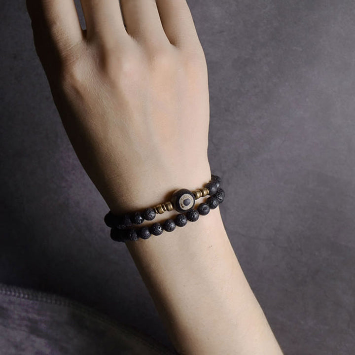 Bracelet de guérison à double tour en perles de cuivre et de laiton avec Buddha Stones de lave vintage à trois yeux Dzi
