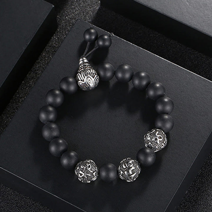 Bracelet de protection Om Mani Padme Hum en Buddha Stones et pierre de lave naturelle œil de tigre et obsidienne noire