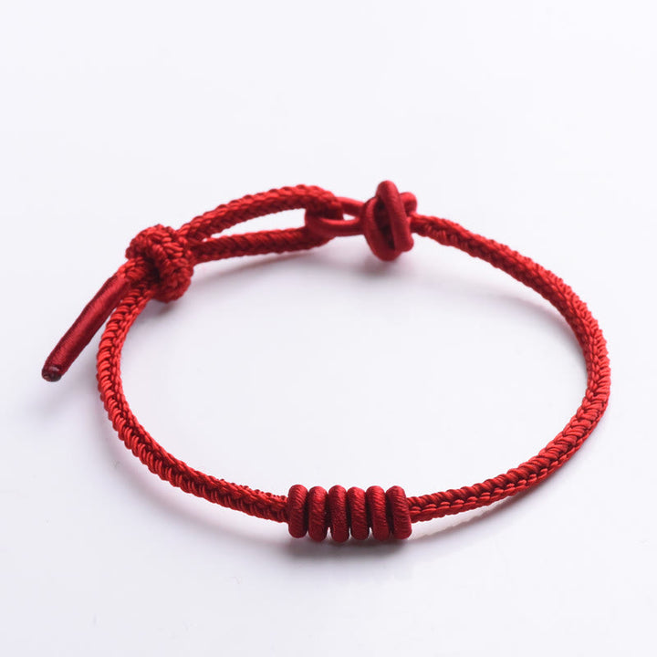 Bracelet de force en corde rouge à huit brins Buddha Stones