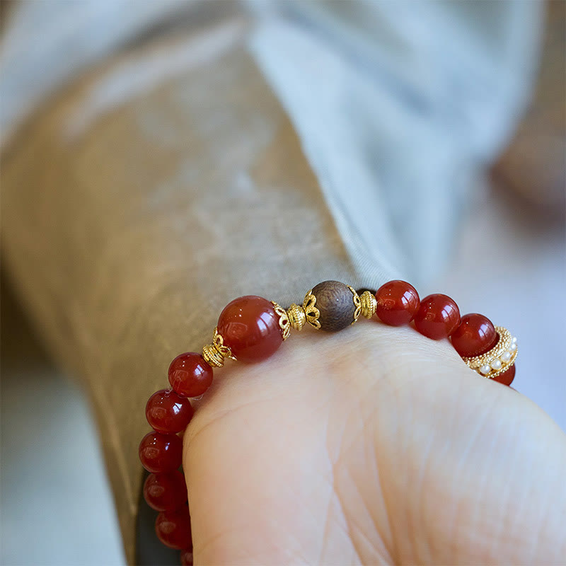 Bracelet de confiance en agate rouge et bois d'agar Buddha Stones