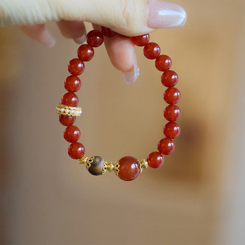Bracelet de confiance en agate rouge et bois d'agar Buddha Stones