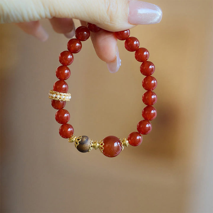 Bracelet de confiance en agate rouge et bois d'agar Buddha Stones