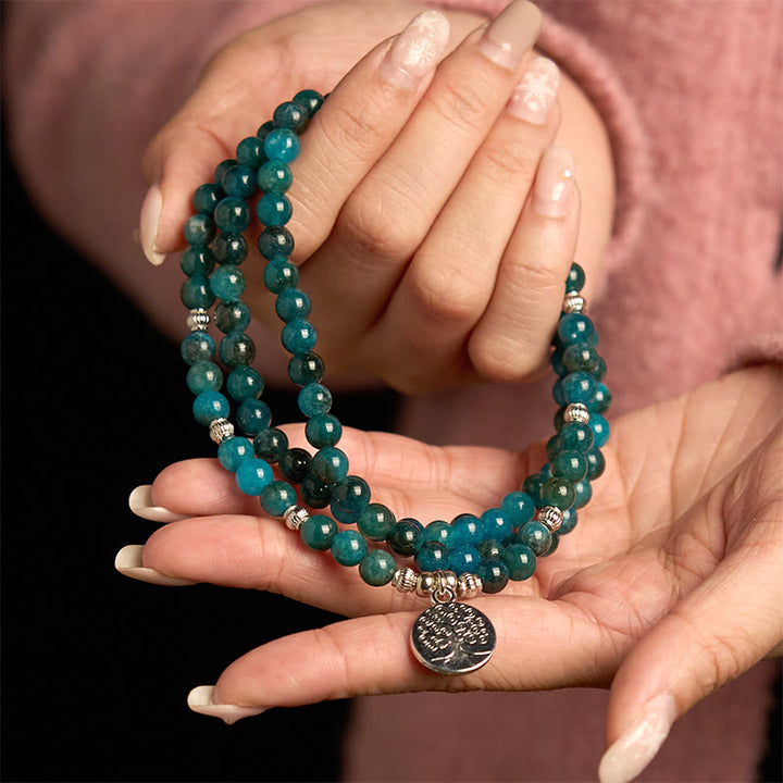 Bracelet Bouddha Lotus 108 Buddha Stones Mala en apatite avec pierres de Bouddha Om L'arbre de vie