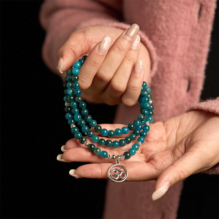 Bracelet Bouddha Lotus 108 Buddha Stones Mala en apatite avec pierres de Bouddha Om L'arbre de vie