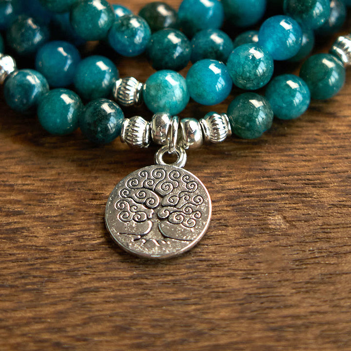 Bracelet Bouddha Lotus 108 Buddha Stones Mala en apatite avec pierres de Bouddha Om L'arbre de vie