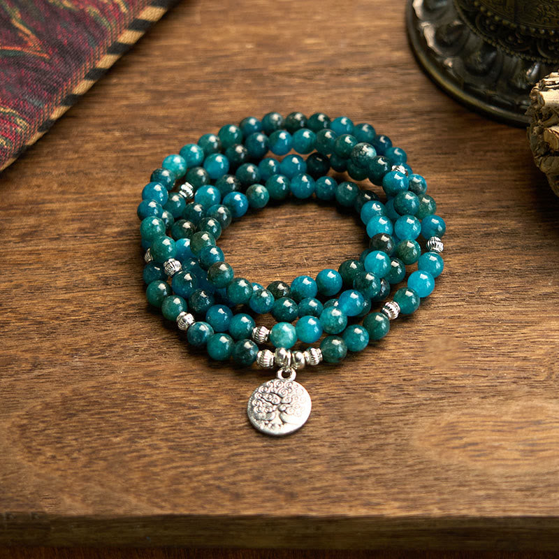 Bracelet Bouddha Lotus 108 Buddha Stones Mala en apatite avec pierres de Bouddha Om L'arbre de vie