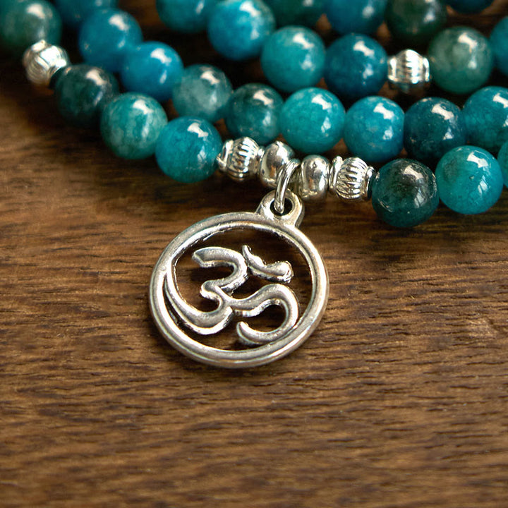Bracelet Bouddha Lotus 108 Buddha Stones Mala en apatite avec pierres de Bouddha Om L'arbre de vie