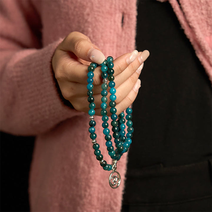 Bracelet Bouddha Lotus 108 Buddha Stones Mala en apatite avec pierres de Bouddha Om L'arbre de vie