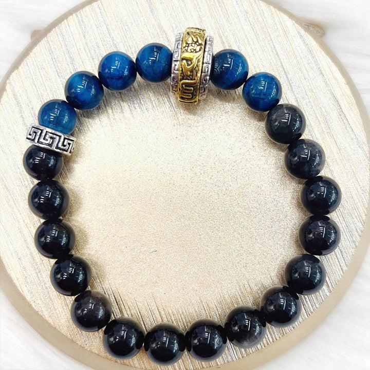 Bracelet de protection œil de tigre bleu en obsidienne argentée et brillante de Buddha Stones