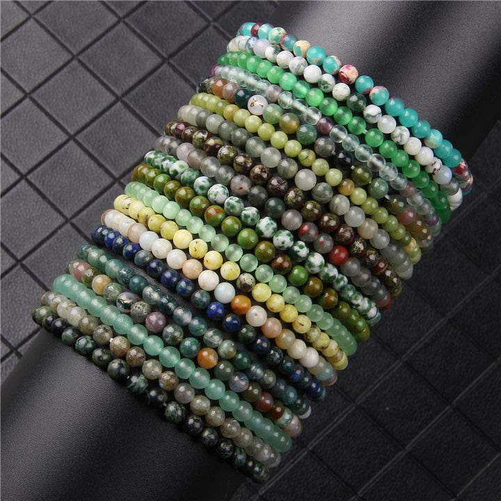 Bracelet de guérison en mini perles de cristal de 4 mm avec Buddha Stones