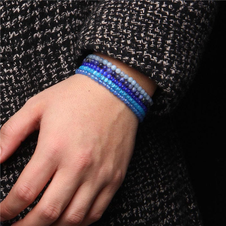 Bracelet de guérison en mini perles de cristal de 4 mm avec Buddha Stones