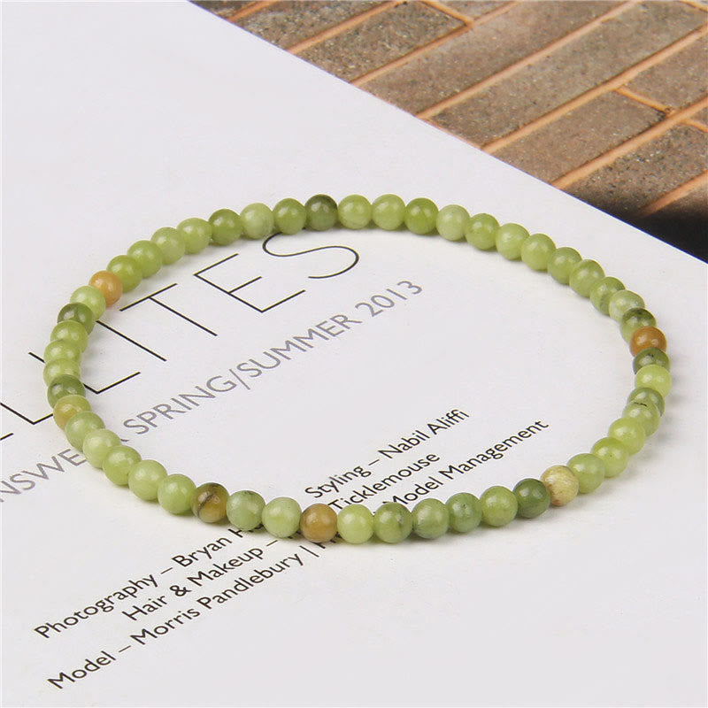 Bracelet de guérison en mini perles de cristal de 4 mm avec Buddha Stones