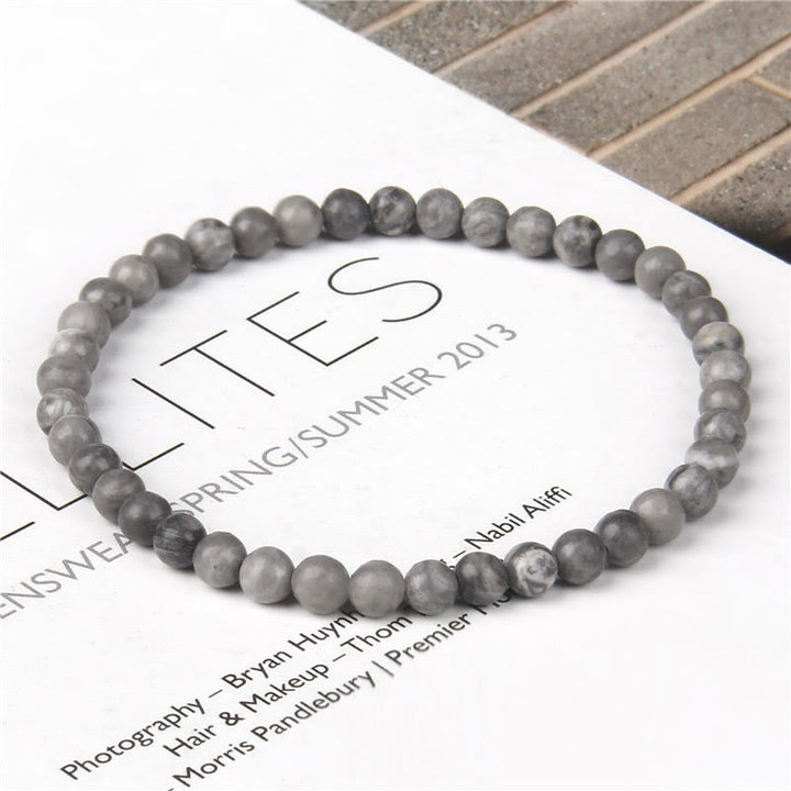 Bracelet de guérison en mini perles de cristal de 4 mm avec Buddha Stones