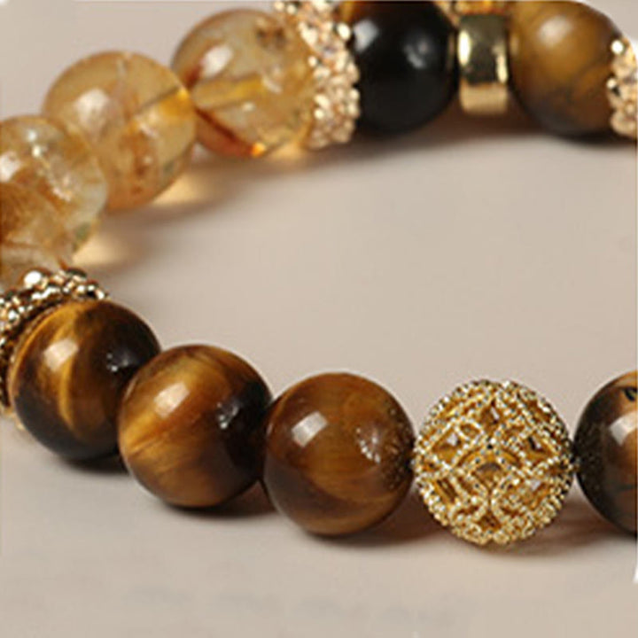 Bracelet de force en perles de citrine et œil de tigre naturelles en Buddha Stones