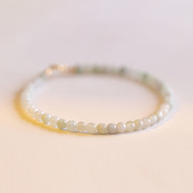 Bracelet porte-bonheur en cuivre plaqué or 14 carats avec perles ultra-fines en jade de 2 mm et Buddha Stones