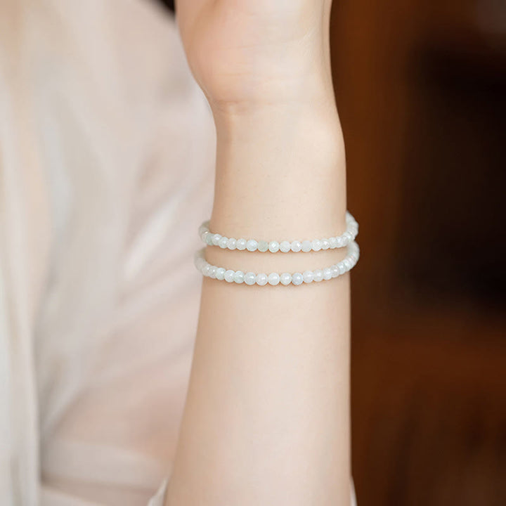 Bracelet porte-bonheur en cuivre plaqué or 14 carats avec perles ultra-fines en jade de 2 mm et Buddha Stones