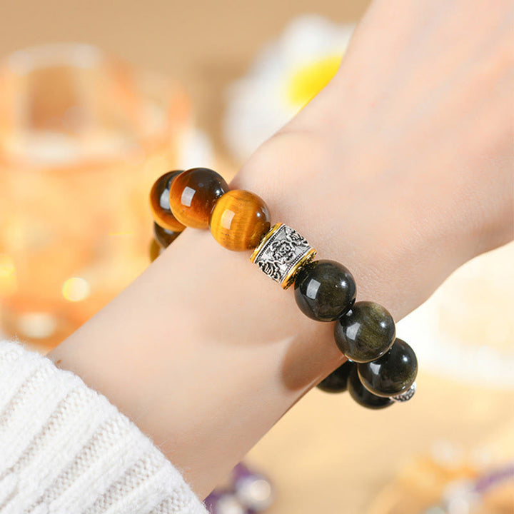 Bracelet en Buddha Stones en œil de tigre et obsidienne dorée brillante Om Mani Padme Hum