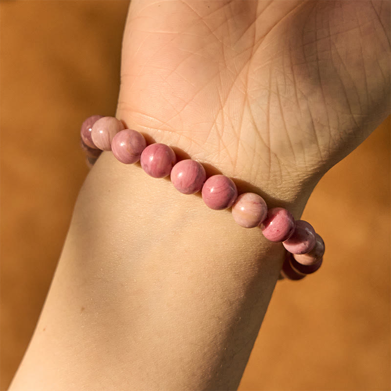 Bracelet de guérison des relations en rhodonite de Buddha Stones