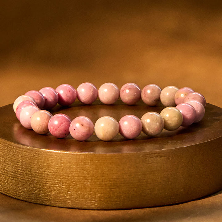 Bracelet de guérison des relations en rhodonite de Buddha Stones