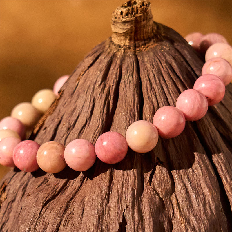 Bracelet de guérison des relations en rhodonite de Buddha Stones