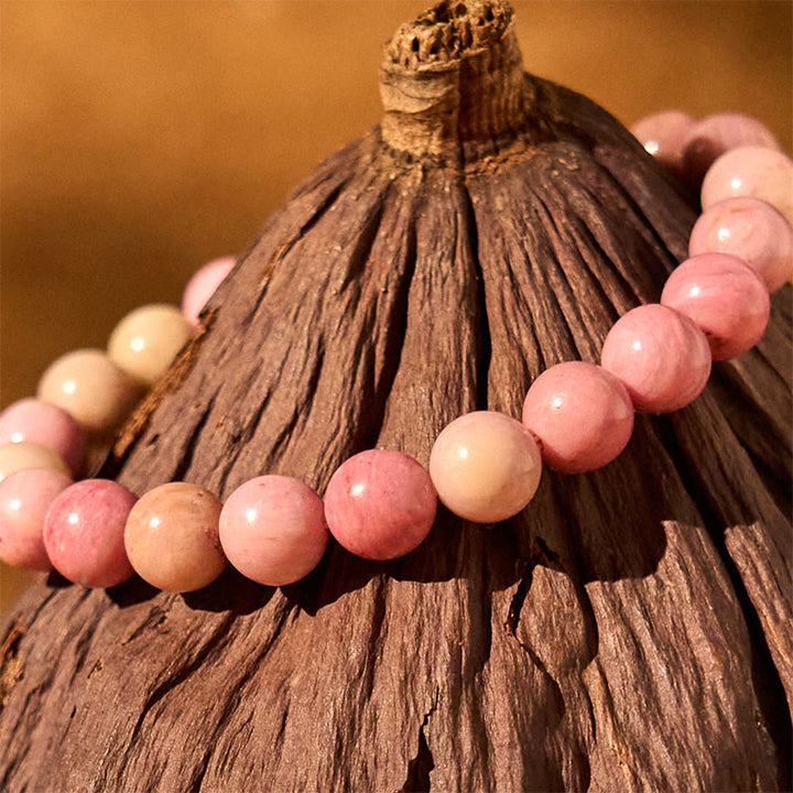 Bracelet de guérison des relations en rhodonite de Buddha Stones