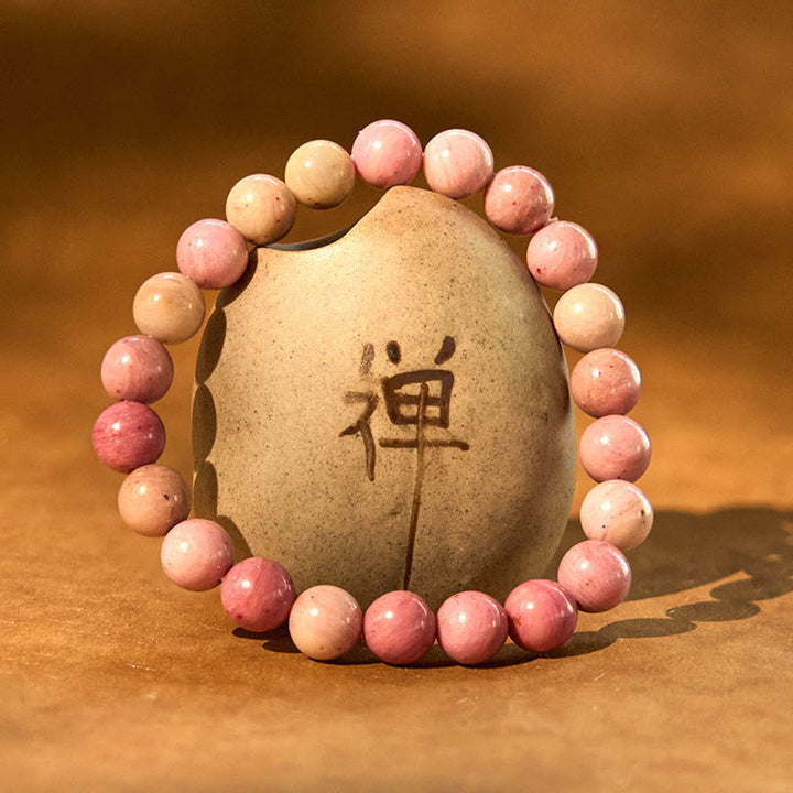 Bracelet de guérison des relations en rhodonite de Buddha Stones
