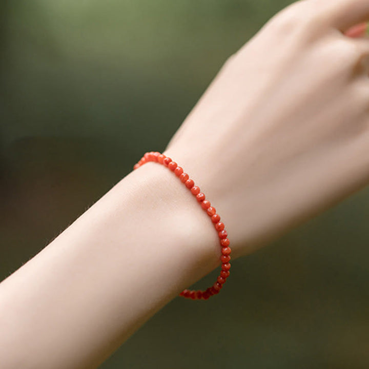 Bracelet de confiance en perles ultra-fines en agate rouge cerise naturelle de Buddha Stones
