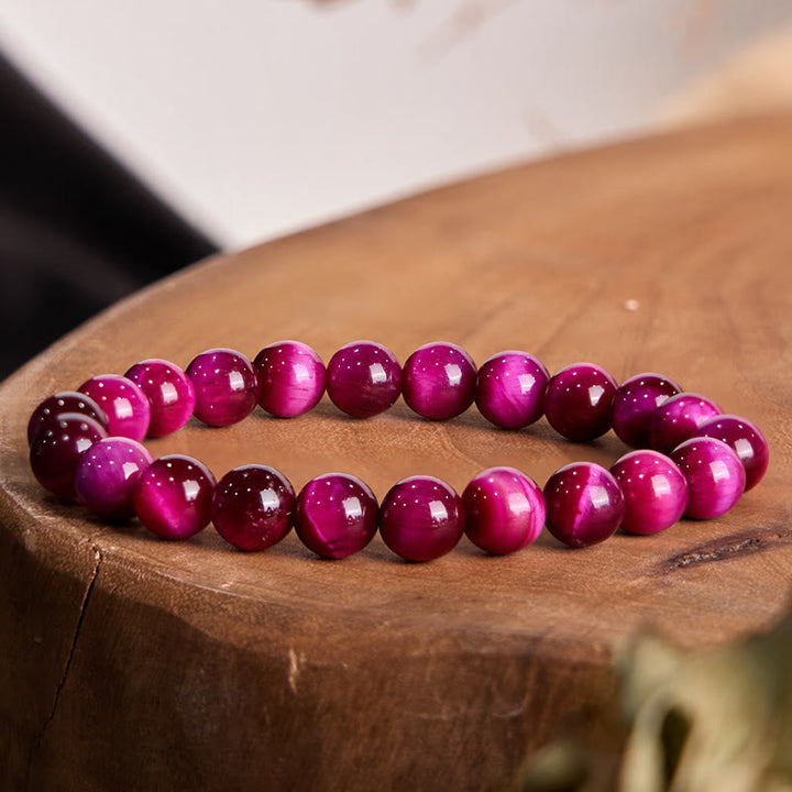 Bracelet apaisant œil de tigre rouge Buddha Stones