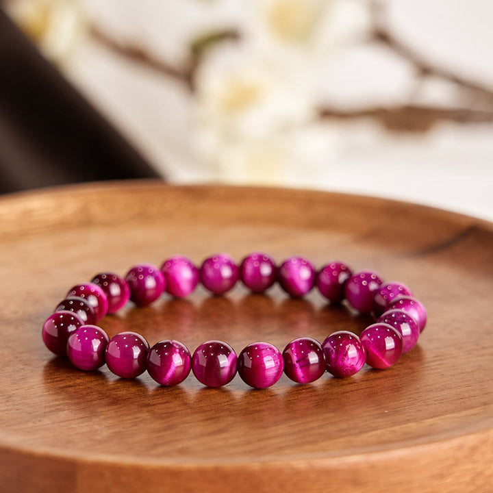 Bracelet apaisant œil de tigre rouge Buddha Stones