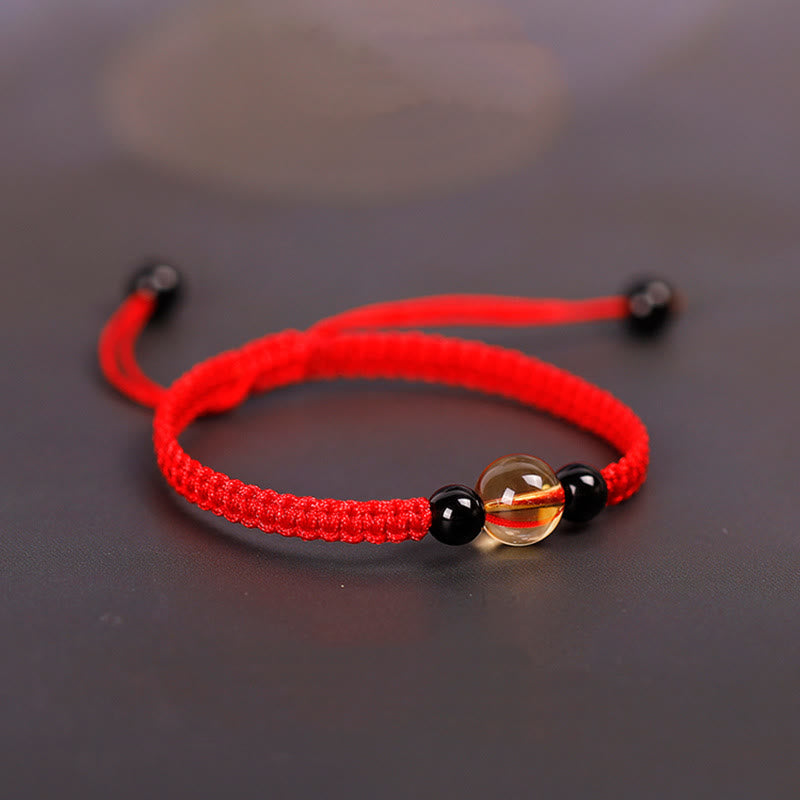 Bracelet en corde porte-bonheur avec nœud de paix et perles d'obsidienne noire en citrine fabriquées à la main par Buddha Stones