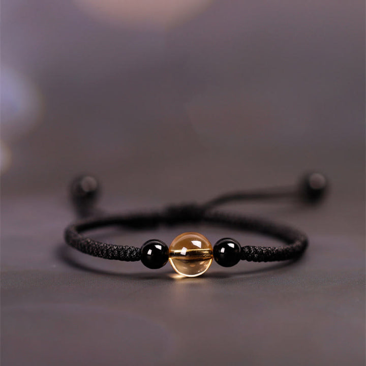 Bracelet en corde porte-bonheur avec nœud de paix et perles d'obsidienne noire en citrine fabriquées à la main par Buddha Stones