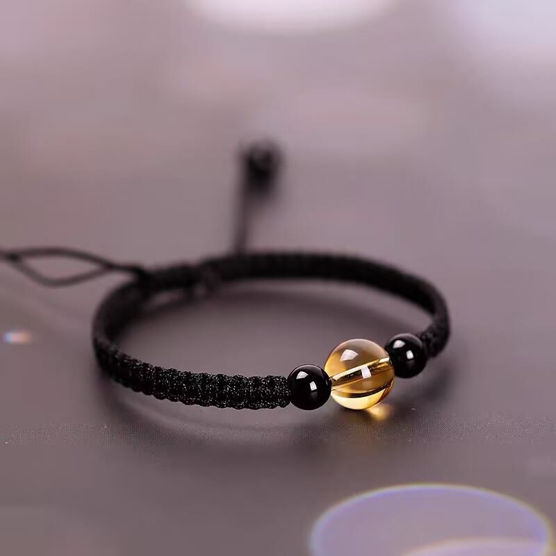 Bracelet en corde porte-bonheur avec nœud de paix et perles d'obsidienne noire en citrine fabriquées à la main par Buddha Stones