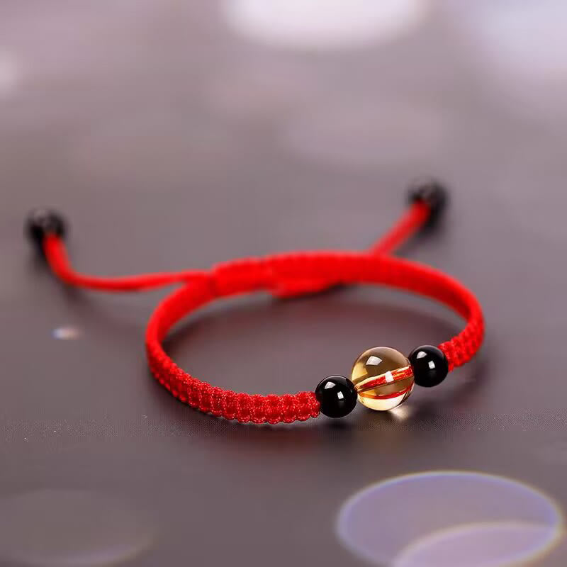 Bracelet en corde porte-bonheur avec nœud de paix et perles d'obsidienne noire en citrine fabriquées à la main par Buddha Stones