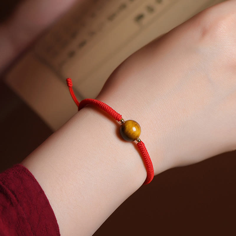 Bracelet en corde de protection porte-bonheur en perles d'œil de tigre faites à la main avec des Buddha Stones